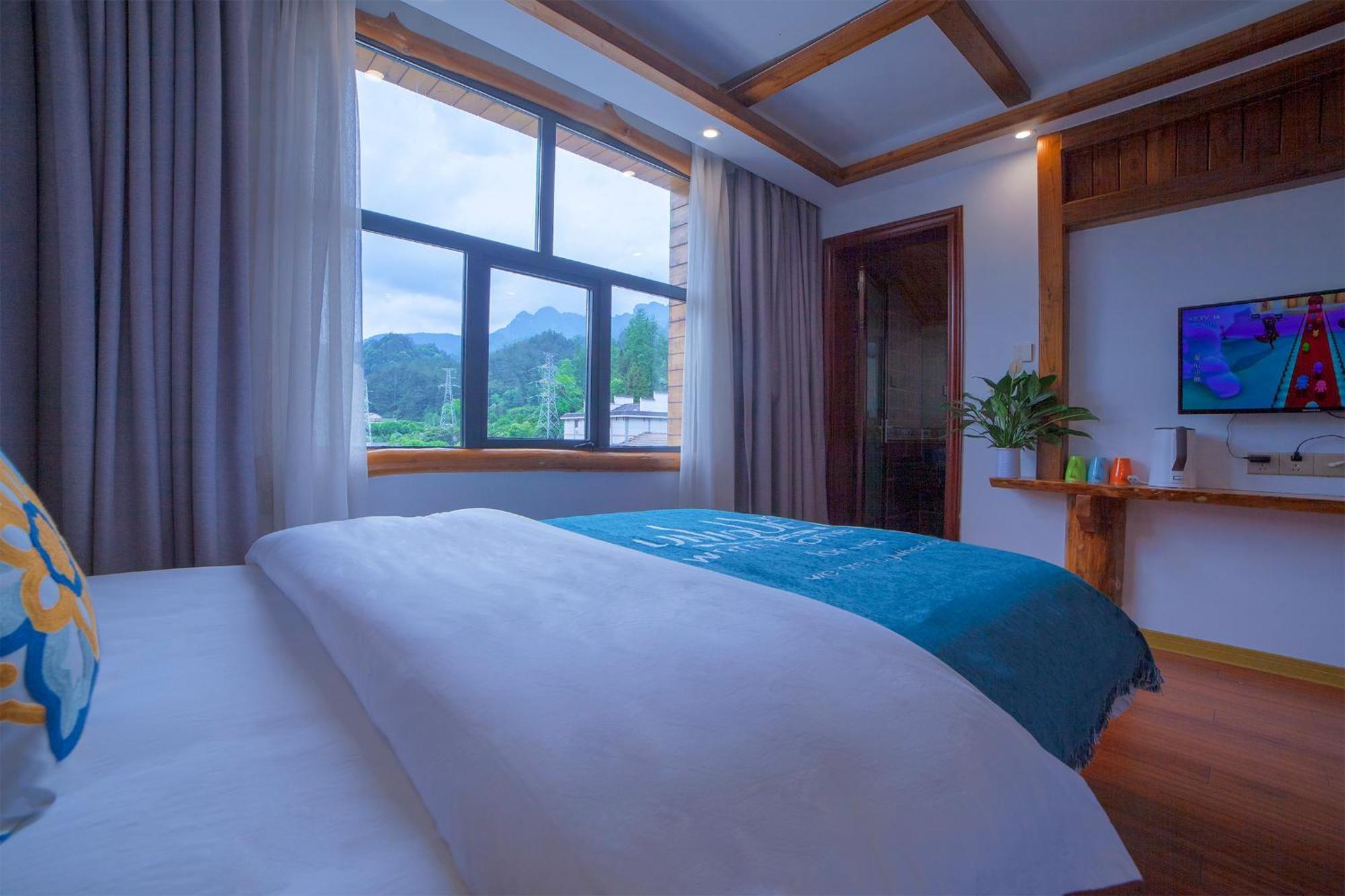 Easy House Hotel Zhangjiajie Buitenkant foto