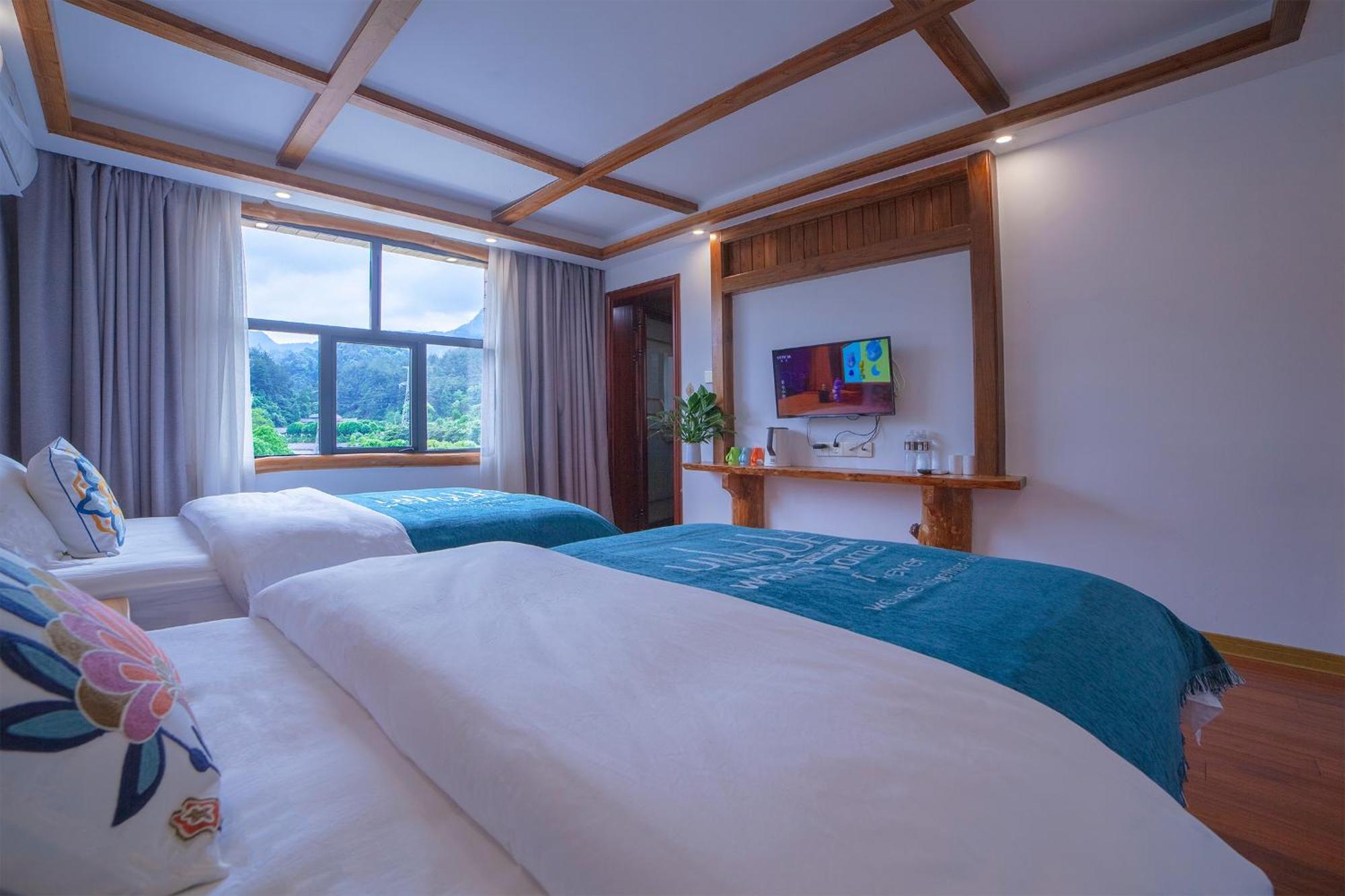 Easy House Hotel Zhangjiajie Buitenkant foto